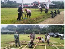 Puluhan Prajurit TNI Dari Kodim 0416/Bute Bersama Warga Desa Teluk Kuali, Kecamatan Tebo Ulu Kabupaten Tebo Lakukan Kerja Bakti